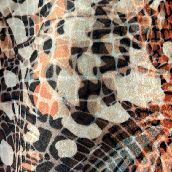Evolution and Creation orange/cream/black patterned athletic pants. Size Large. - Picture 3 of 6
